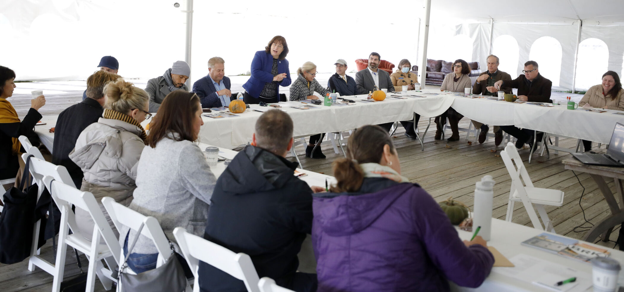 group meets at Hancock Shaker Village under tent